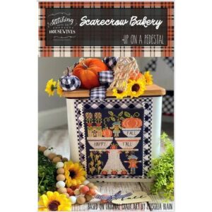 Stitching with the Housewives Scarecrow Bakery Up on a Pedestal